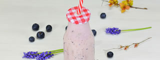 Blueberry smoothie with straw Blueberry smoothie with straw