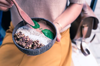 A breakfast smoothie bowl using cocoa powder