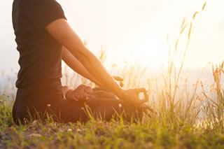 Meditating outdoors Meditating outdoors