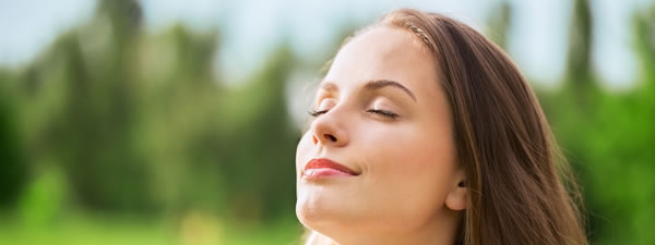 Healthy woman breathing