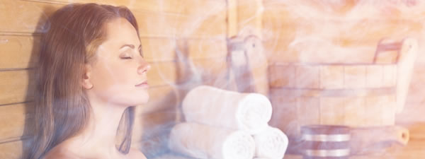 woman relaxing in a sauna