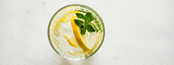 a glass of lemon water