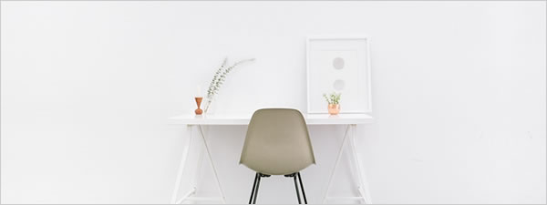 A desk space in a home that practises minimalism