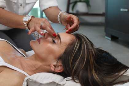 A woman getting a head massage