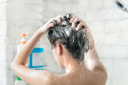 Woman washing her hair