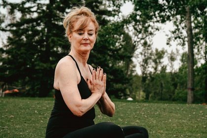 Woman doing yoga in the park