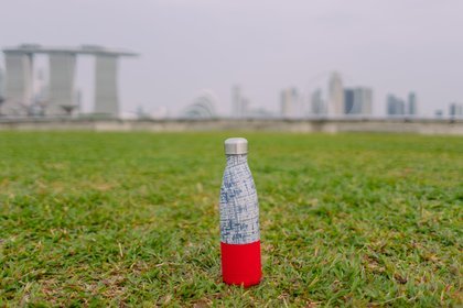 gray and red bottle