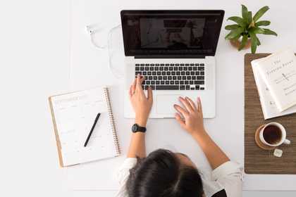 A woman using a laptop