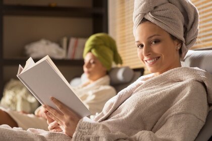 People reading book in spa