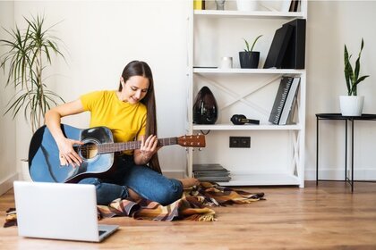 Playing guitar