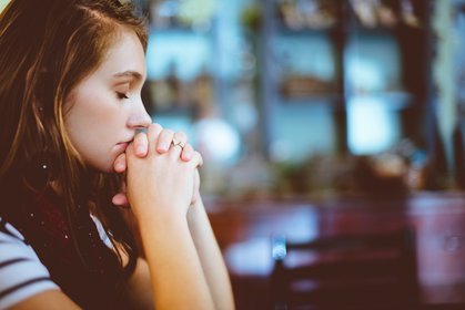 woman meditating at work