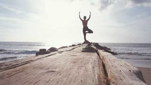 A person doing yoga outside