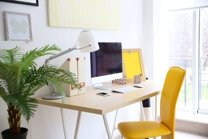 Desk next to a large window