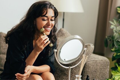 Person using a jade roller