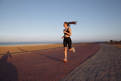 Person running near beach